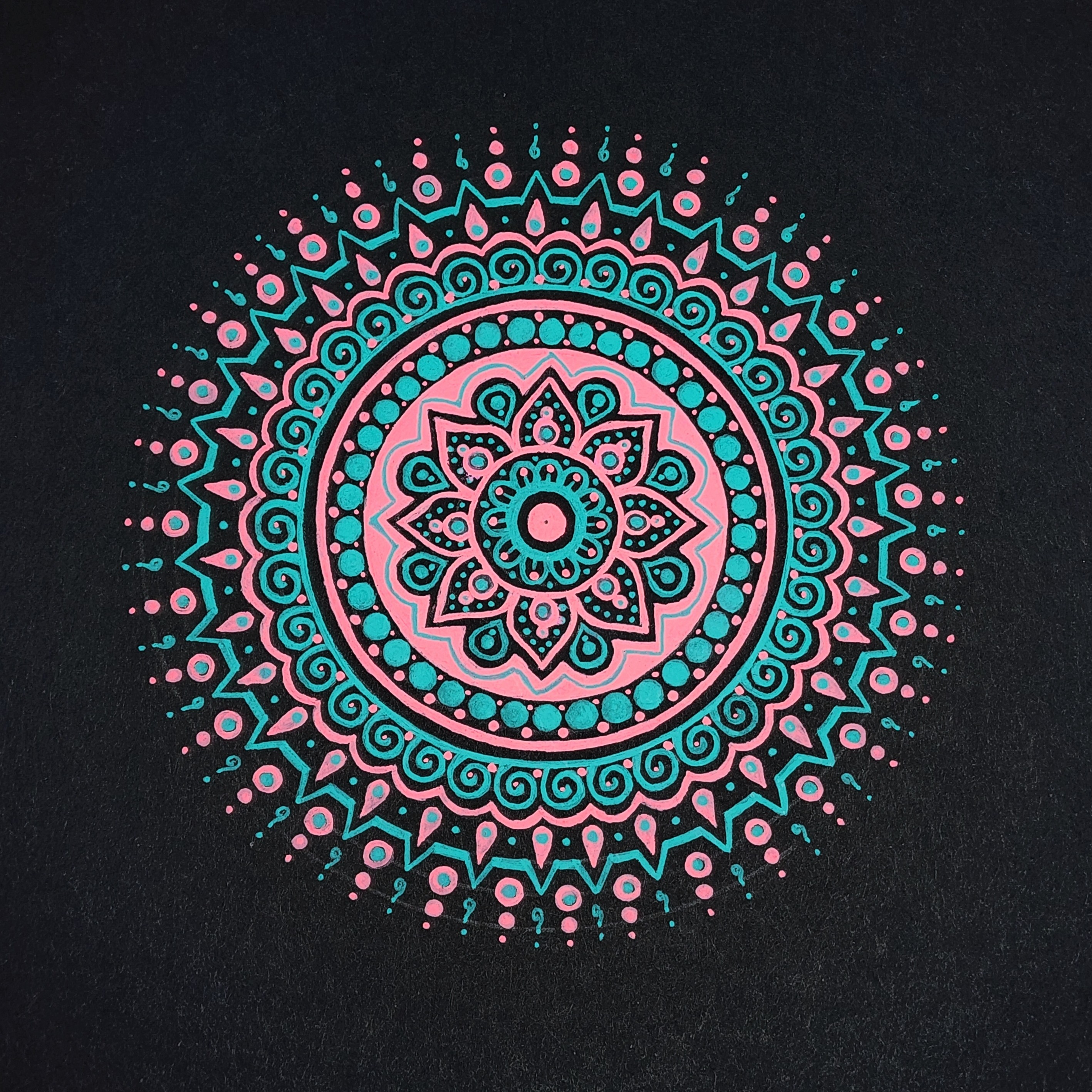 Hand-drawn neon mandala in teal and pink on black paper — Fractal Alley
