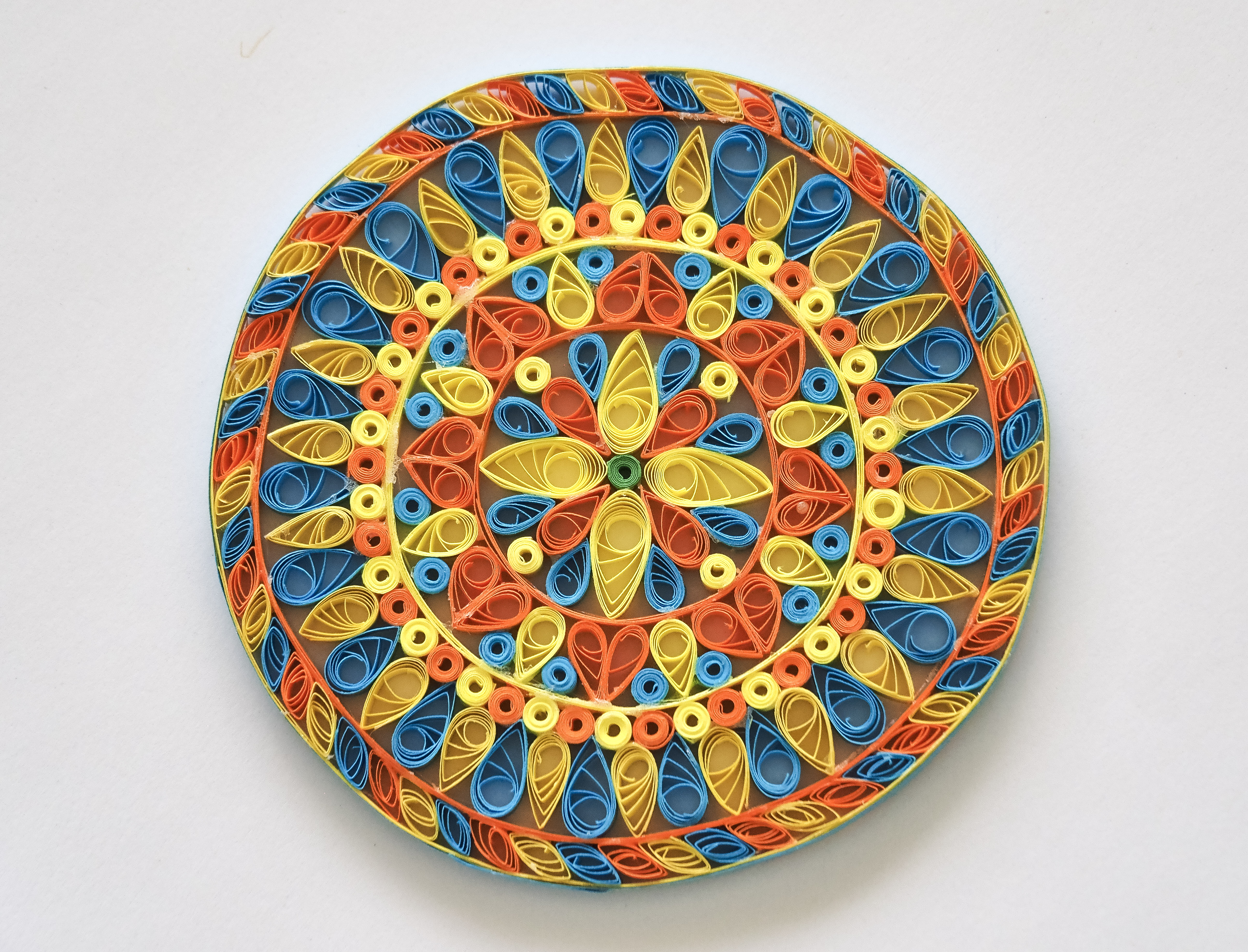 Quilled mandala in blue, orange and yellow — Fractal Alley original